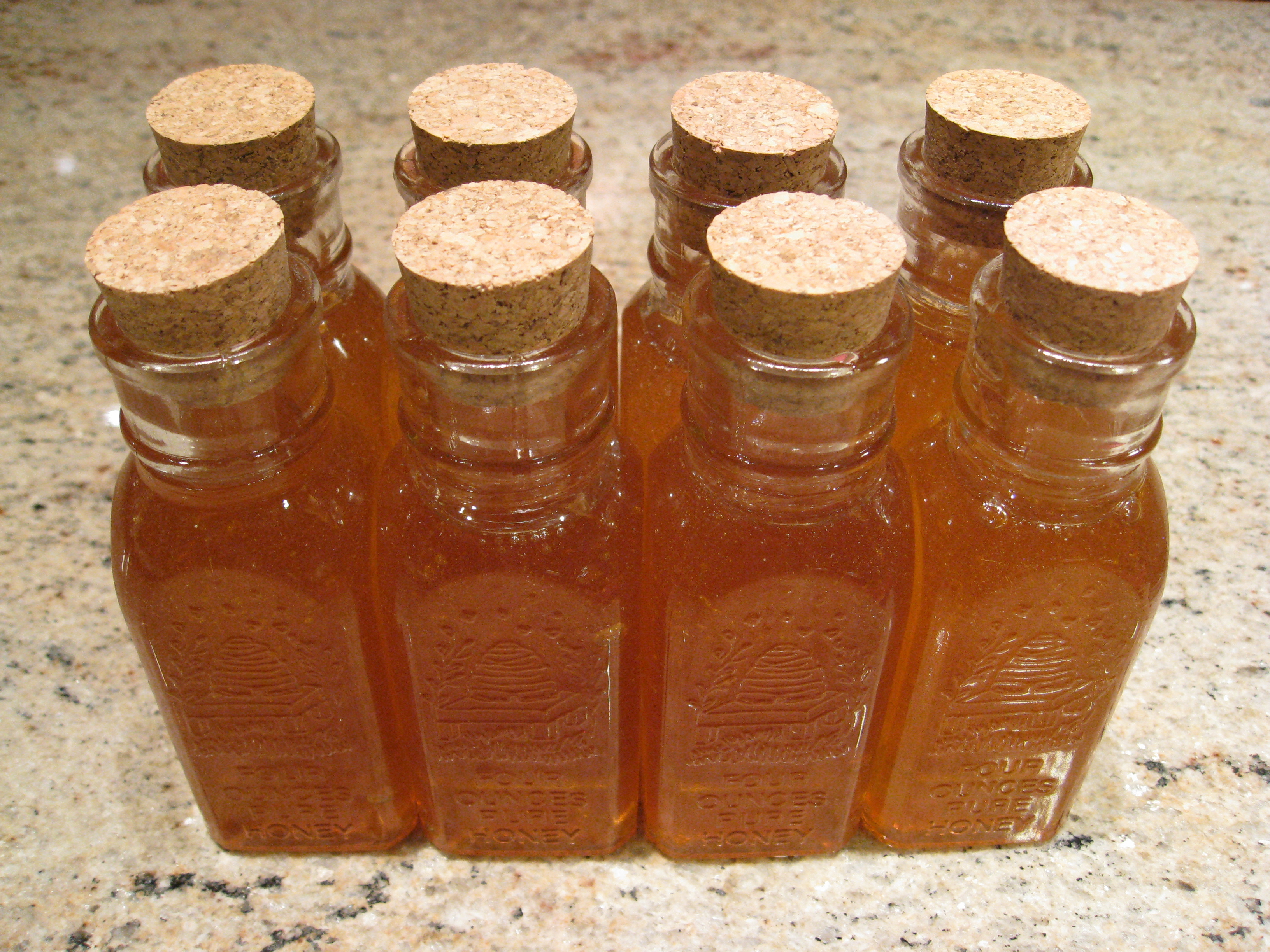 Freshly harvested honey in gift jars
