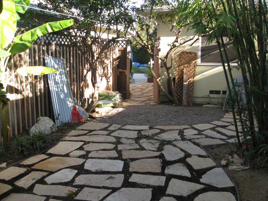 Flagstone and gravel can't be trampled by dogs. 