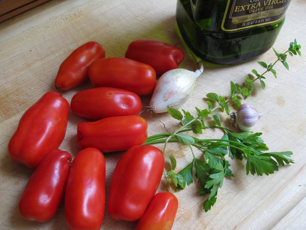 San Marzano tomatoes, fresh parsley, fresh oregano, and homegrown garlic and onions.
