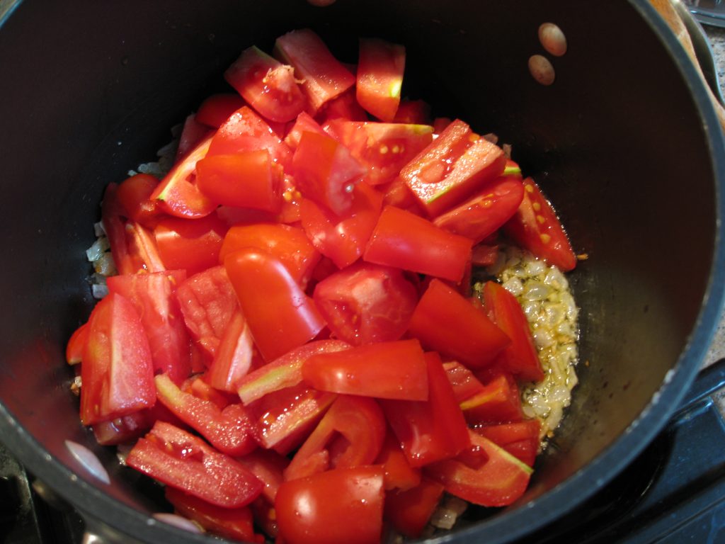 Chopped tomatoes, onion and garlic in olive oil