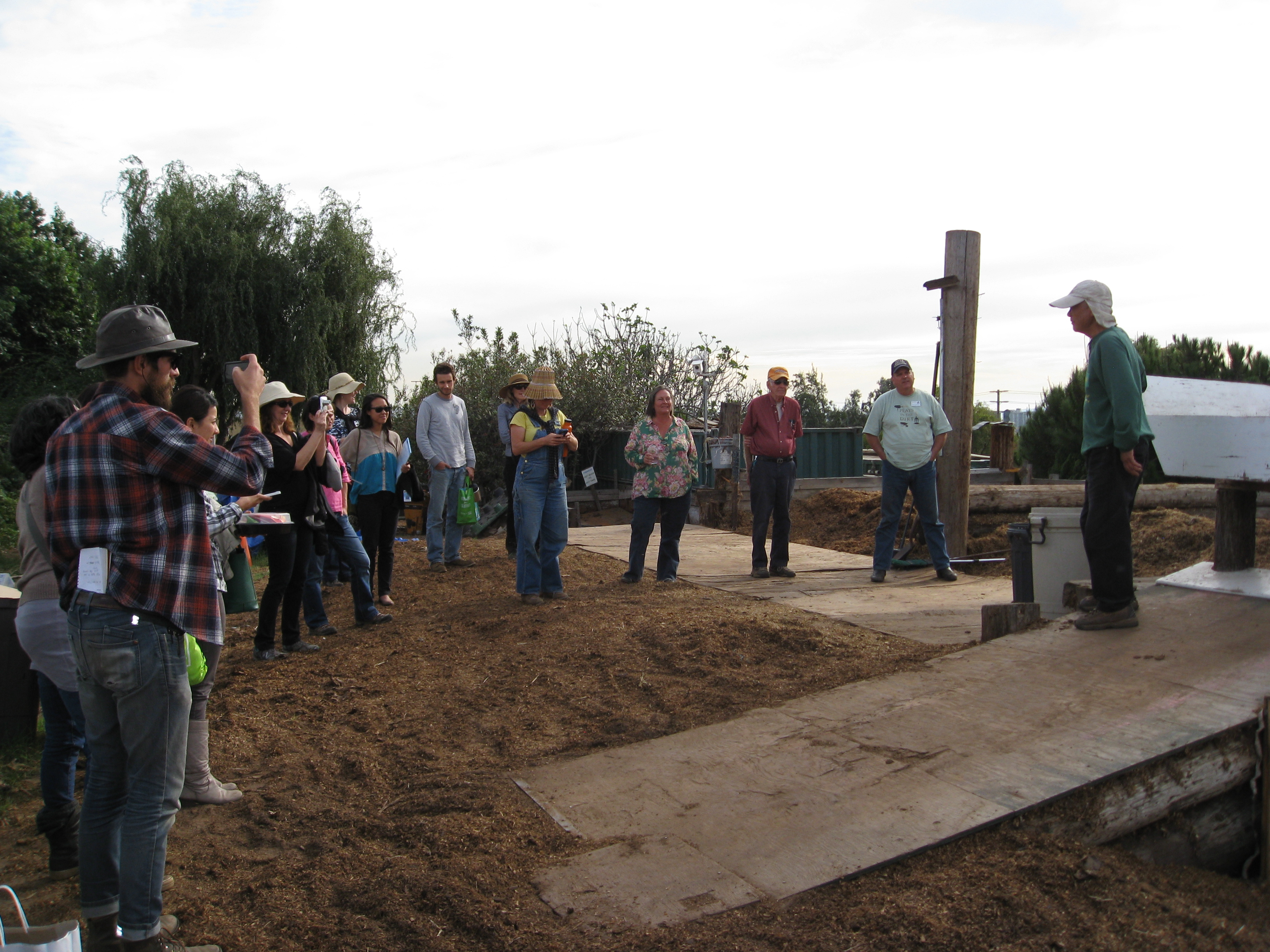 Visitors learn how Ocean View Farms uses horse manure (otherwise bound for the landfill) to make compost for members and the community.