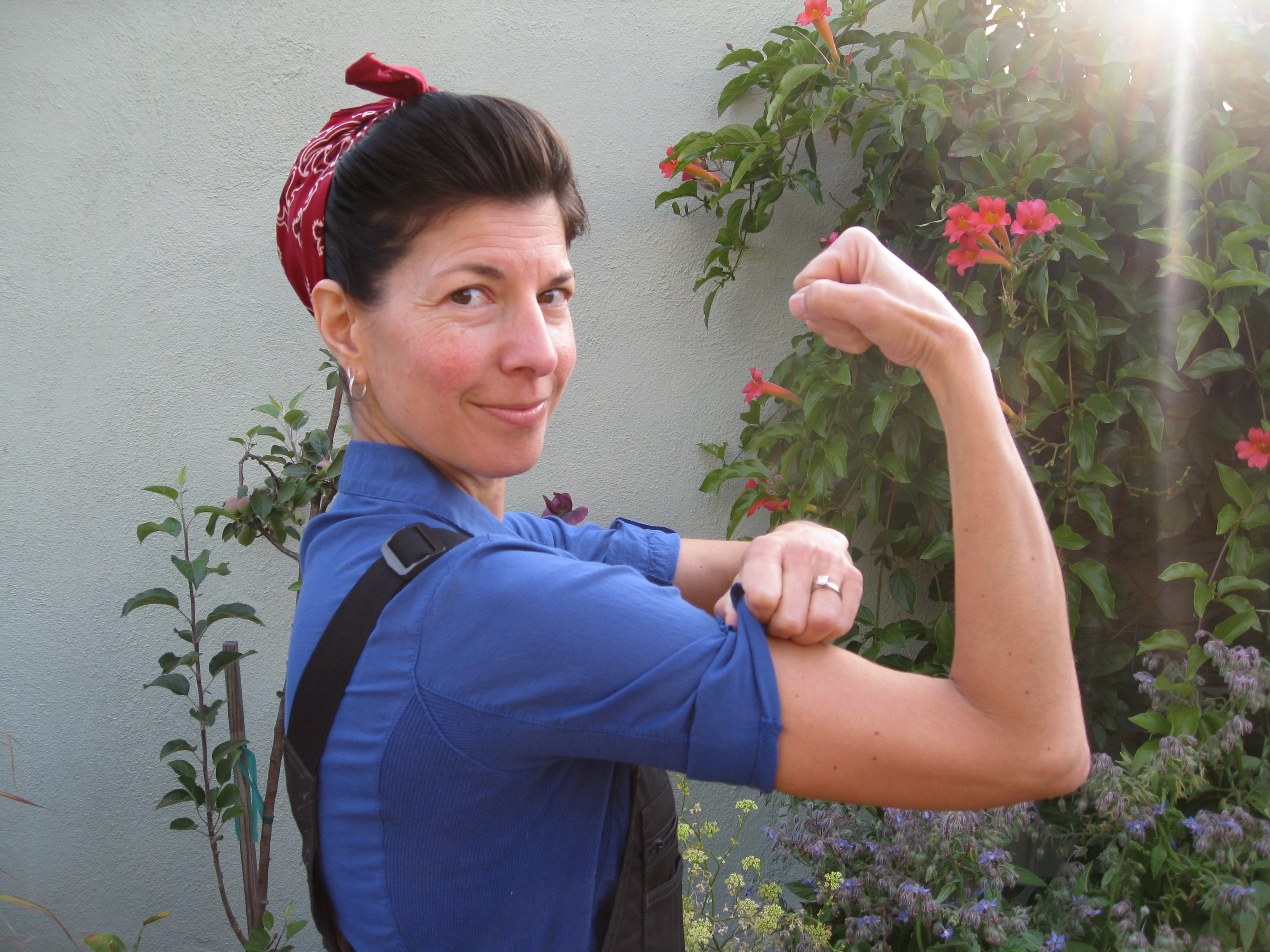 Christy the Riveter models Rosie's Workwear professional overalls. 
