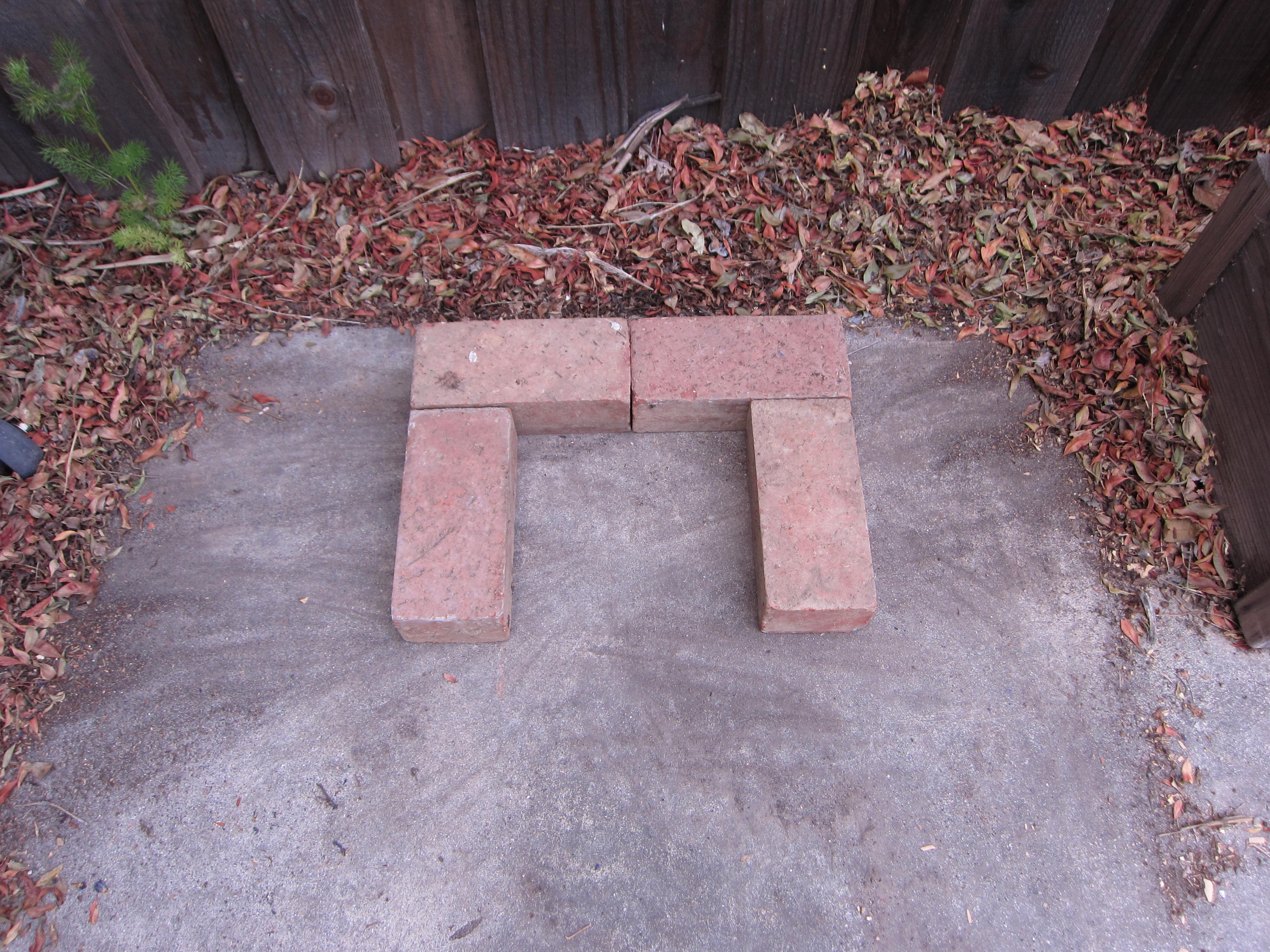 4 bricks placed thusly for the foundation of your rocket stove.