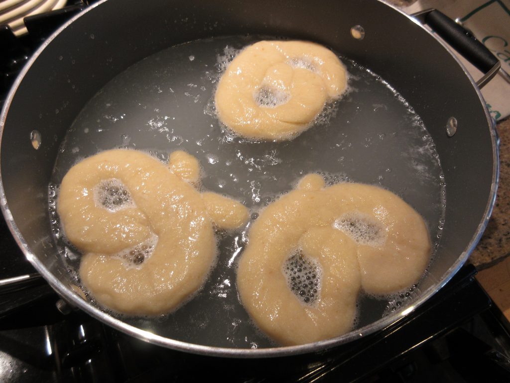 Boiling sourdough pretzels